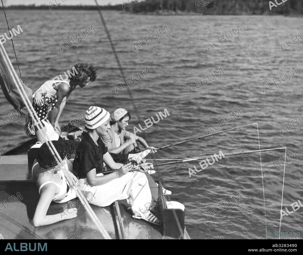 Key Largo, Florida:  c. 1927 Some of the younger members of the Key Largo Anglers Club fishing offshore near the club.