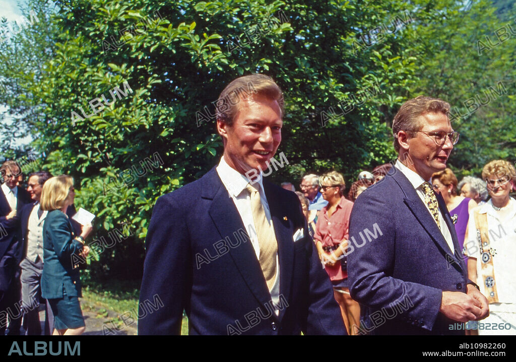 Prince Henri of Luxembourg (left) at the wedding of Princess Alexandra zu Sayn Wittgenstein Sayn and Prince Carl Eugen zu Oettingen and Wallerstein at Bendorf, Germany 1994.