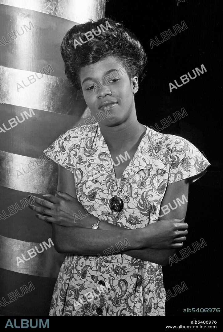Portrait of Sarah Vaughan, Café Society (Downtown), New York, N.Y., ca. Sept. 1946. Vaughan (1924-1990) was an American jazz singer. Nicknamed "Sassy" and "The Divine One," she won four Grammy Awards, including the Lifetime Achievement Award. She was given an NEA Jazz Masters Award in 1989.