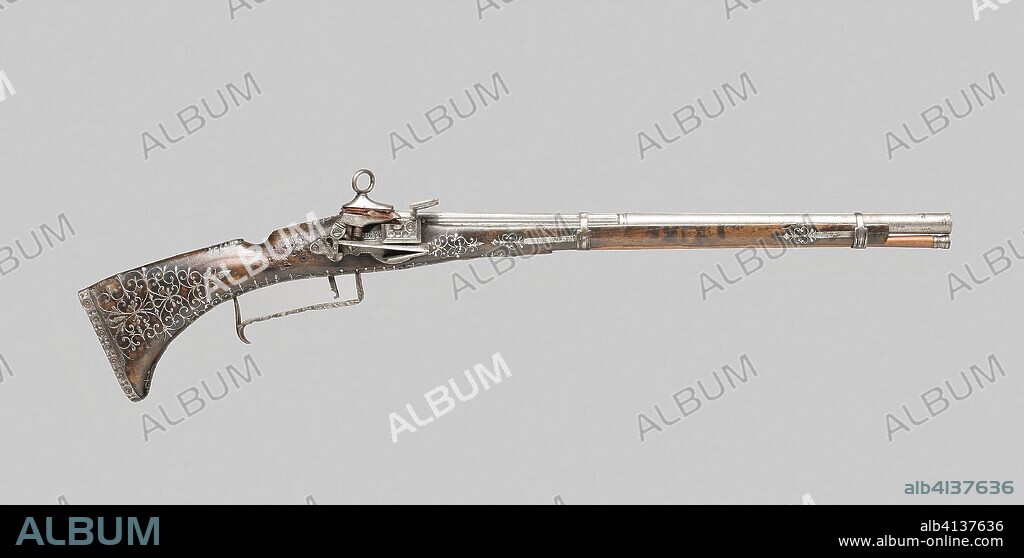 Miquelet Carbine. Spanish; Ripoll. Date: 1680-1700. Dimensions: L. 86 cm (33 7/8 in.)
Barrel L. 56.2 cm (22 1/8 in.)
Caliber .68
Wt. 4 lb. 11 oz. Steel, iron, walnut. Origin: Spain.