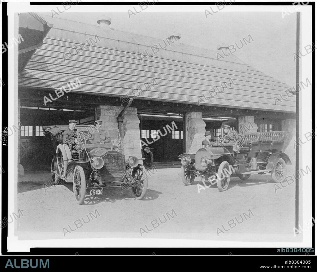 FRANCES BENJAMIN JOHNSTON. Four men with two automobiles outside of garage of Edmund Cogswell Converse, Greenwich, Connecticut, 1908. The Conyers Farm estate, designed by Donn Barber c1904, was owned by businessman Edmund C. Converse.