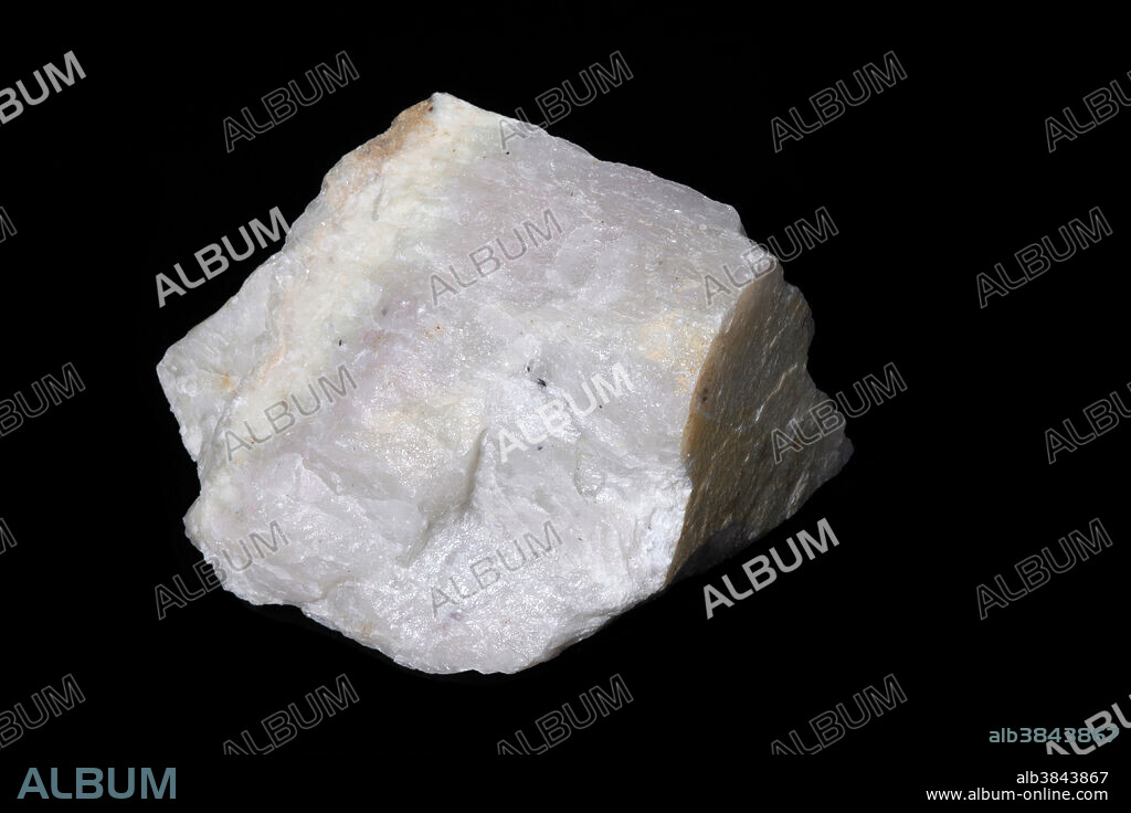Hackmanite is an important variety of sodalite exhibiting fluorescence. This specimen of hackmanite is from Ontario Canada. Photographed under white light. Part of a series of the specimen in different lights.