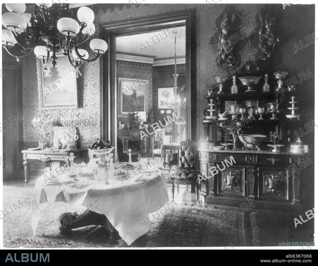 FRANCES BENJAMIN JOHNSTON. Lowery House, 1890s. Dining room with table set.