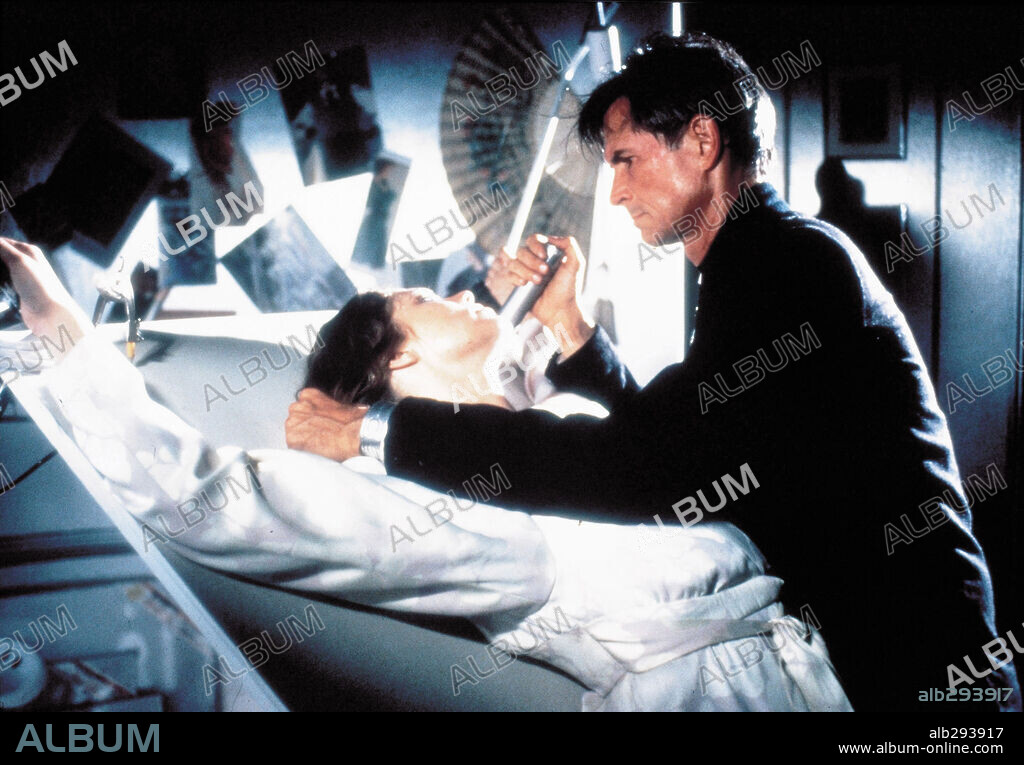 ANTHONY PERKINS and KATHLEEN TURNER in CRIMES OF PASSION, 1984, directed by KEN RUSSELL. Copyright NEW WORLD INTERNATIONAL.