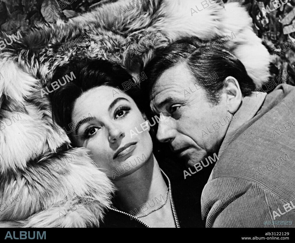 ANOUK AIMEE and YVES MONTAND in ONE NIGHT... A TRAIN, 1968 (SOIR, UN TRAIN, UN). Copyright PARC/FOX EUROPA/FILMS DU SIECLE.