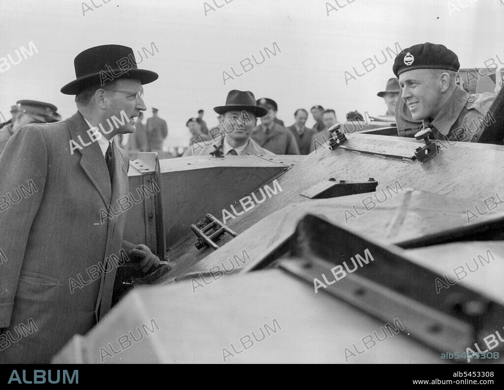 Rommel General Sees British Tanks -- General Speidel, former Chief of staff to Marshal Rommel, stops to speak to the driver of a Centurion 3 tank (L/Cpl Alan Weller, of Burgess Hill, Sussex) during his visit to the R.A.C. Range at Lulworth today as a member of the West German delegation of the European Defence Community Committee now visiting British to see British Military equipment, and planes. There was a row in the House of Commons over the visit of this former enemy general. May 01, 1953.