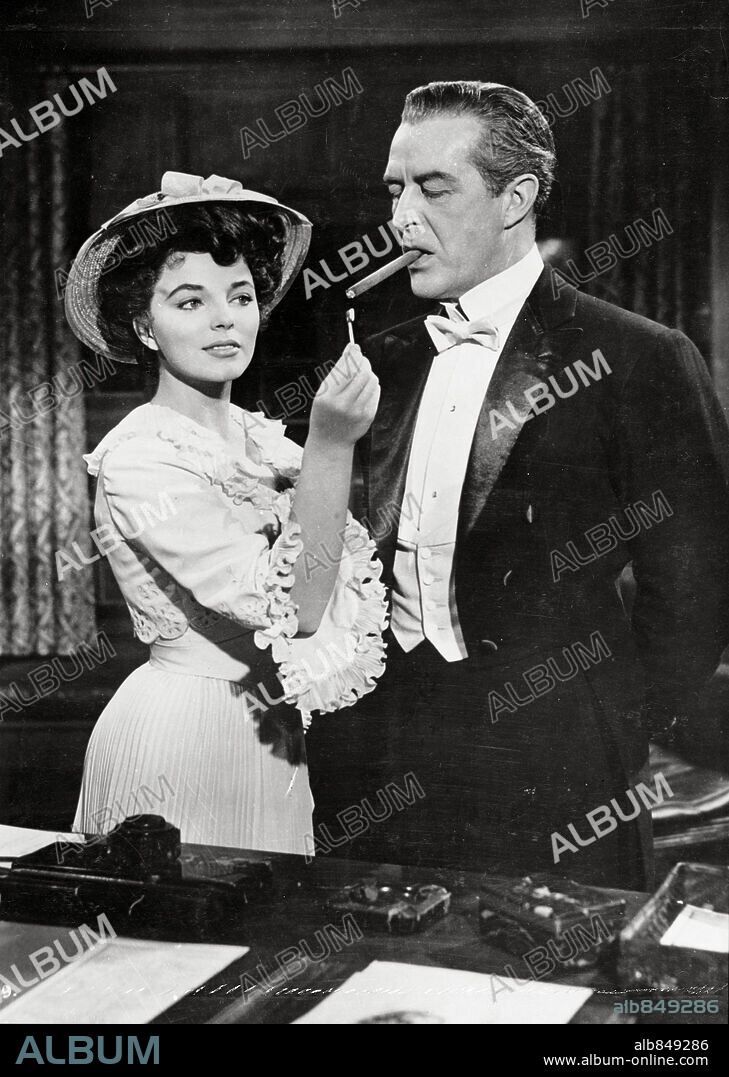 JOAN COLLINS and RAY MILLAND in THE GIRL IN THE RED VELVET SWING, 1955, directed by RICHARD FLEISCHER. Copyright 20TH CENTURY FOX.