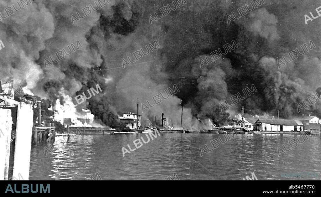 Cavite Navy Yard in Philippines Burns After Japanese Air Raid circa 1941.