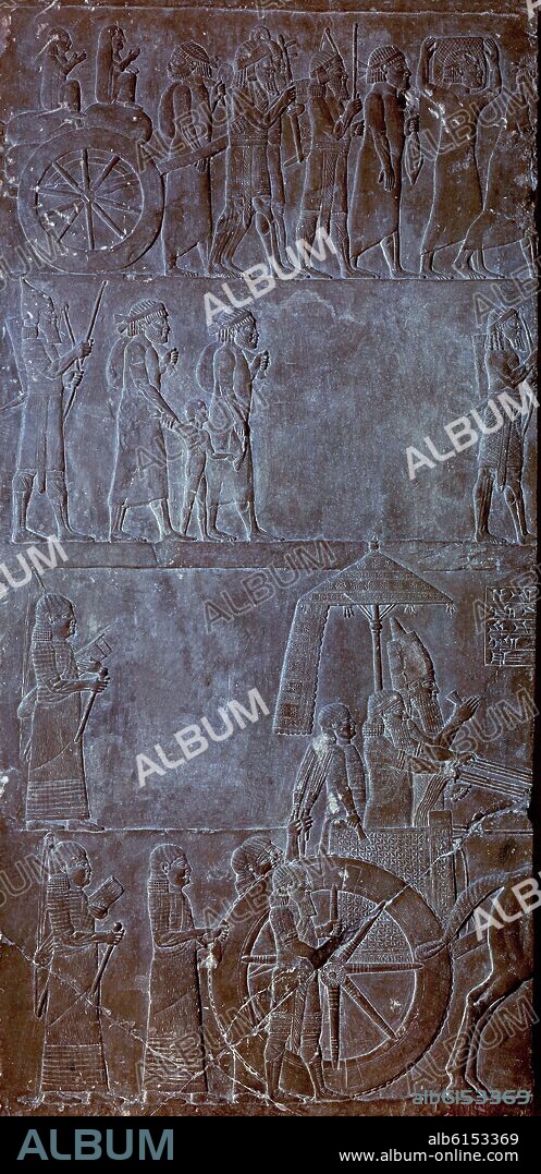 RELIEVE DEL PALACIO DE ASURBANIPAL - ASURBANIPAL SOBRE UN CARRO EN UN DESFILE - SIGLO VII AC - ARTE ASIRIO.