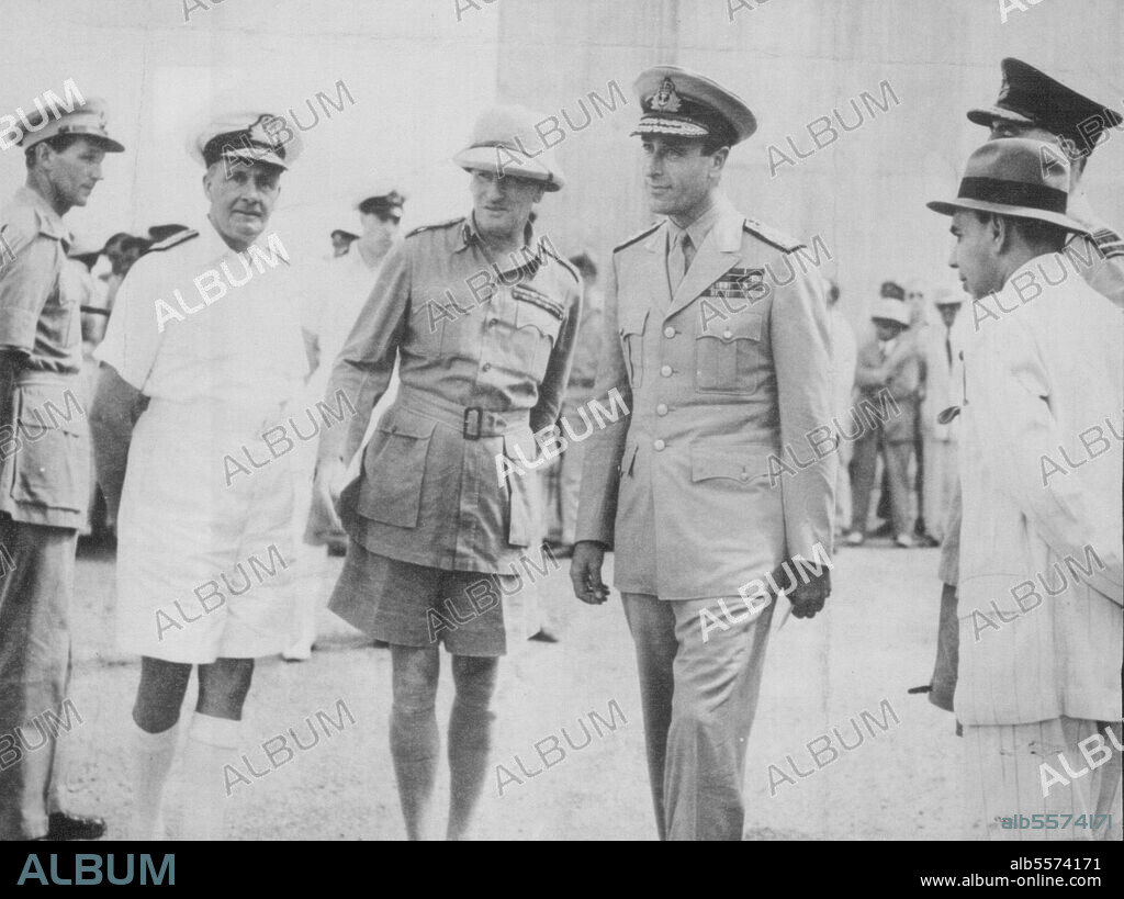 Mountbatten Greeted In New Delhi - Admiral Lord Louis Mountbatten, Supreme allied Commander, SouthEast Asia Command, with British Military and civil officials who were among the Allied Commanders who greeted him on his arrival in New Delhi, India, seat of his headquarters for the first time since assuming his new command. Left to right: Admiral Sir James Sommerville, Commander-in-Chief, Eastern Fleet; General Sir Claude Auchinleck, Commander-in-Chief, India; Lord Mountbatten; Mr. C.M. Trivedi, Secretary, War Department; and air Chief Marshal Sir Richard Peirse, air officer Commanding-in-Chief, The Air Force in India (Partially hidden by Mr. Trivedi). October 29, 1943. (Photo by Associated Press Photo).