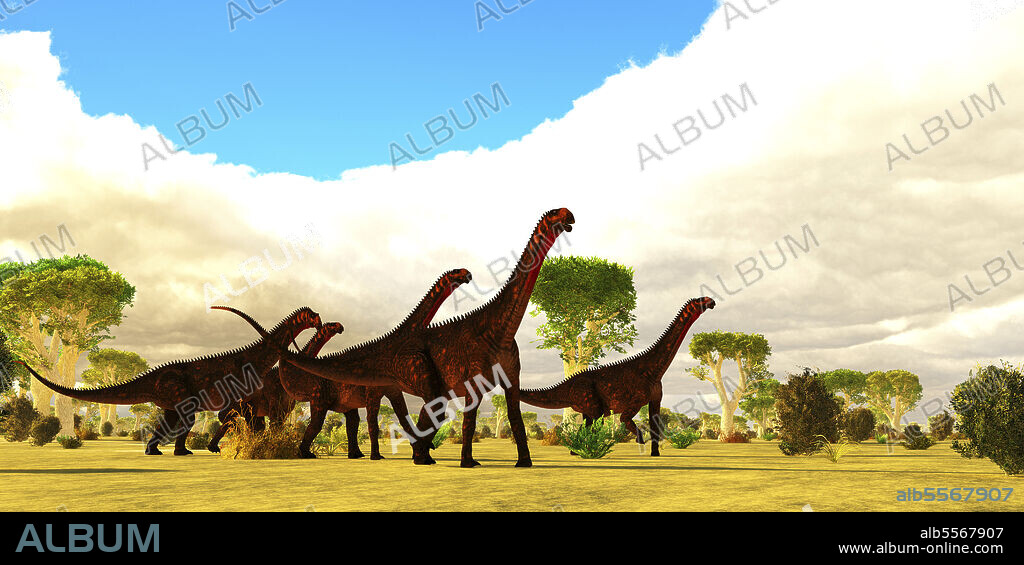 A Mierasaurus sauropod dinosaur herd travels together amongst a landscape of red oak trees during the Cretaceous Period of Utah, USA.
