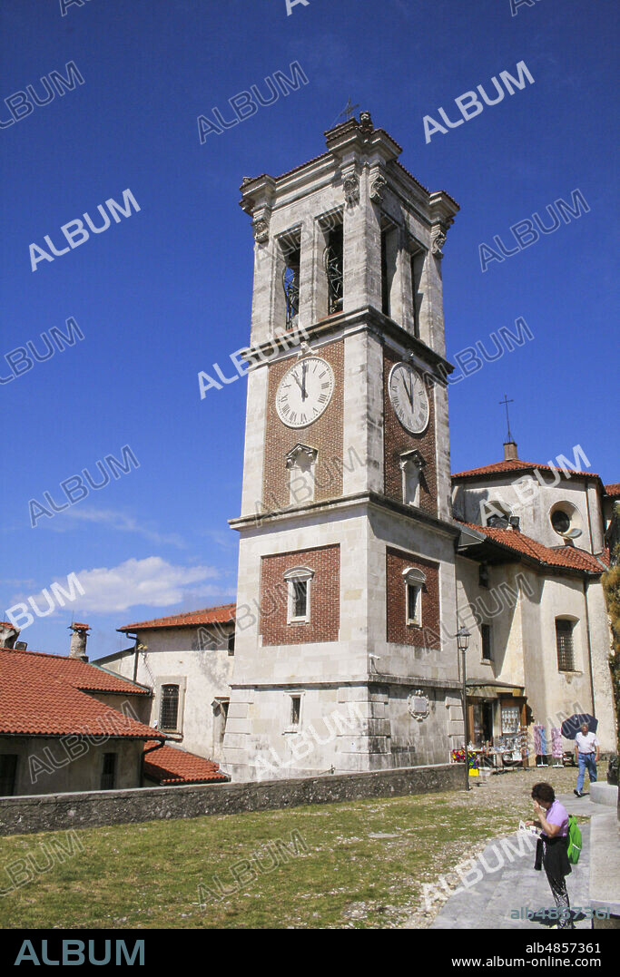 Varese, Lombardy, Italy, Europe. Sacro Monte di Varese (Sacred Mount of Varese), UNESCO World Heritage site. Santuario Santa Maria del Monte, the bell and clock tower.