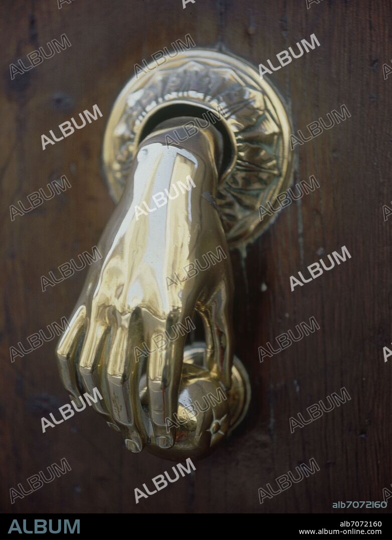 LLAMADOR (ALDABA) - FORMA DE MANO.