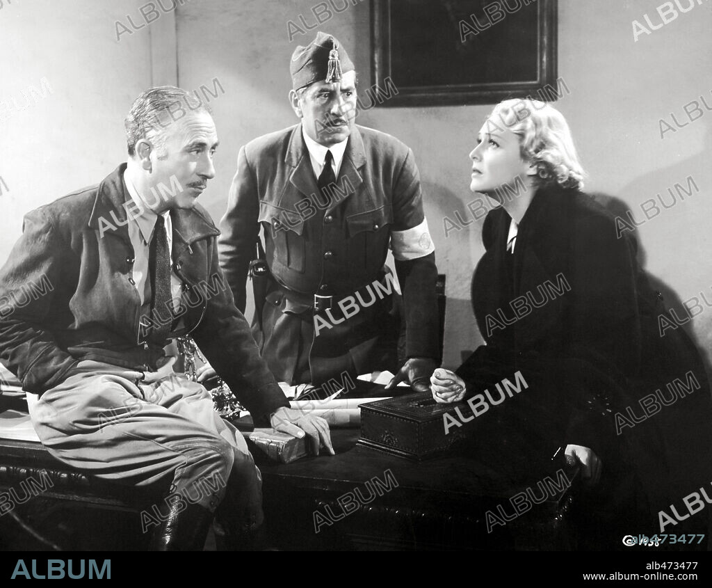 JOHN HALLIDAY, MADELEINE CARROLL and ROBERT WARWICK in BLOCKADE, 1938, directed by WILHELM DIETERLE. Copyright UNITED ARTISTS.