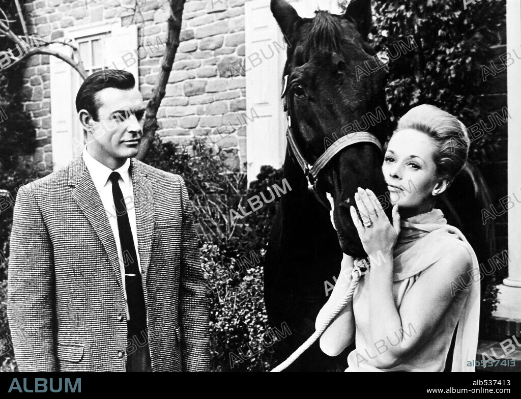 SEAN CONNERY and TIPPI HEDREN in MARNIE, 1964, directed by ALFRED HITCHCOCK. Copyright UNIVERSAL PICTURES.