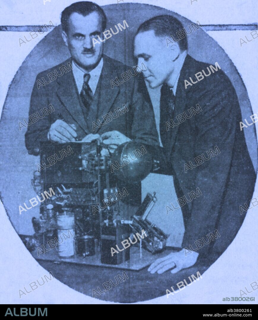 Compton (left) and his assistant, Richard Doan, look over equipment that Compton built for recording the intensity of cosmic rays in the stratosphere. The equipment will be carried into the stratosphere on a balloon and the measurements will be transmitted to the ground by radio. Arthur Holly Compton (September 10, 1892 - March 15, 1962) was an American physicist. In 1919, Compton was awarded a National Research Council Fellowship that allowed students to study abroad. He chose the Cavendish Laboratory in England, where he studied the scattering and absorption of gamma rays which led to the discovery of the Compton effect. He used X-rays to investigate ferromagnetism, concluding that it was a result of the alignment of electron spins, and studied cosmic rays, discovering that they were made up principally of positively charged particles. He won the Nobel Prize in Physics in 1927 for his discovery. During WWII, he was a key figure in the Manhattan Project that developed the first nuclear weapons. After the war, Compton became Chancellor of Washington University in St. Louis. During his tenure, the university formally desegregated its undergraduate divisions, named its first female full professor, and enrolled a record number of students after wartime veterans returned to the United States. He died in 1962 from a cerebral hemorrhage at the age of 69.