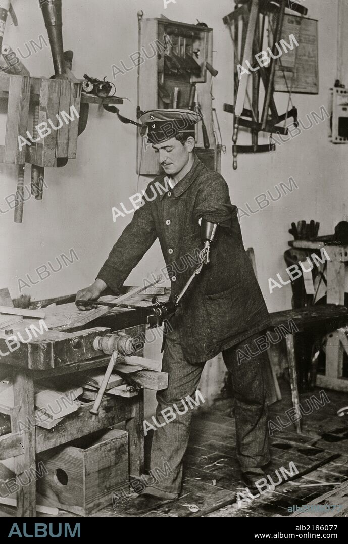 Maimed German at work.