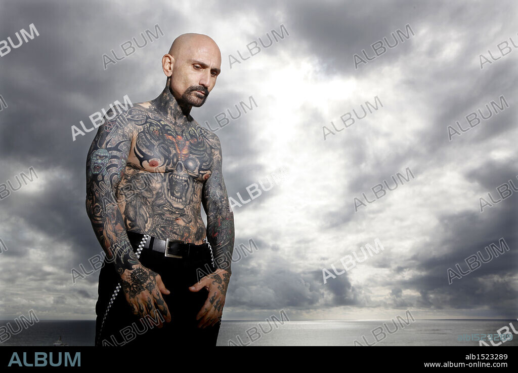 ROBERT LASARDO. Feb 07, 2011 - Malibu, California, U.S. - Actor ROBERT LASARDO (born September 20, 1963 in Brooklyn, New York) is an American actor. He appears in movies and television shows, such as Escobar Gallardo from the first, second, fourth and sixth season of the TV series Nip/Tuck. LaSardo began his career studying at the famed High School of Performing Arts in New York City, before going on to the Stella Adler Studio of Acting. Robert also spent four years in the U.S. Navy, spending two of those years handling Navy attack dogs in the Aleutian Islands. LaSardo has extensive chest, neck, and arm tattoos. He is an Italian American, although he is often cast as a Latino or Latin-American character, and usually as a criminal or gang member. 07/02/2011