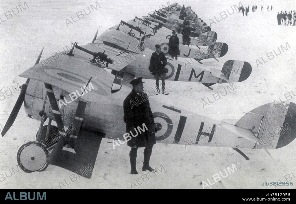 No. 1 (F) Squadron is a squadron of the Royal Air Force. The squadron motto, In omnibus princeps ("First in all things" reflects the squadron's status as the RAF's oldest unit, having been involved in almost every major British military operation from WWI to the present time. In August 1914, and equipped with a mixture of Avro 504s and Royal Aircraft Factory B.E.8s, crossed over to France on March 7, 1915. It operated mainly in the reconnaissance role, with a few single seat fighters for escort purposes. It became a dedicated fighter squadron on January 1, 1917, flying Nieuport 17s and Nieuport 27. The obsolete Nieuports were replaced by more modern S.E.5as in January 1918. Caption: "No. 1 RAF squadron of French Nieuport Scouts line up in the snow at the aerodome in Bailleul, December 27, 1917. Above 3,000 feet the wind chill would have been insufferable.".