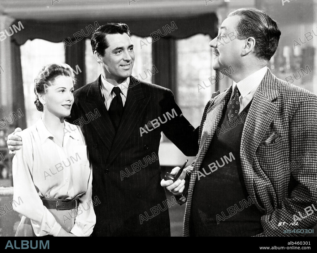 CARY GRANT, JOAN FONTAINE and NIGEL BRUCE in SUSPICION, 1941, directed by ALFRED HITCHCOCK. Copyright RKO.