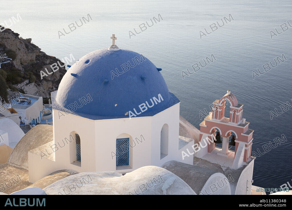 Blue-domed church in Santorini, Cyclades, Greek Islands, Greece, Europe.