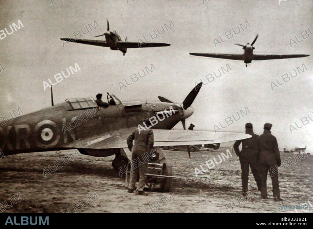 Photograph of the American 'Eagle Squadron'. The Eagle Squadron were three fighter squadrons of the Royal Air Force (RAF), formed with volunteer pilots from the United States during the early days of World War II, before America's entry into the war. Also pictured, is a Hawker Hurricane, a British single-seat fighter aircraft. Dated 20th Century.