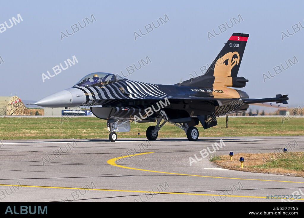 A Solo Turk F-16 of the Turkish Air Force performing at Izmir Air Show, Turkey, during the 100th Anniversary of the Turkish Air Force.