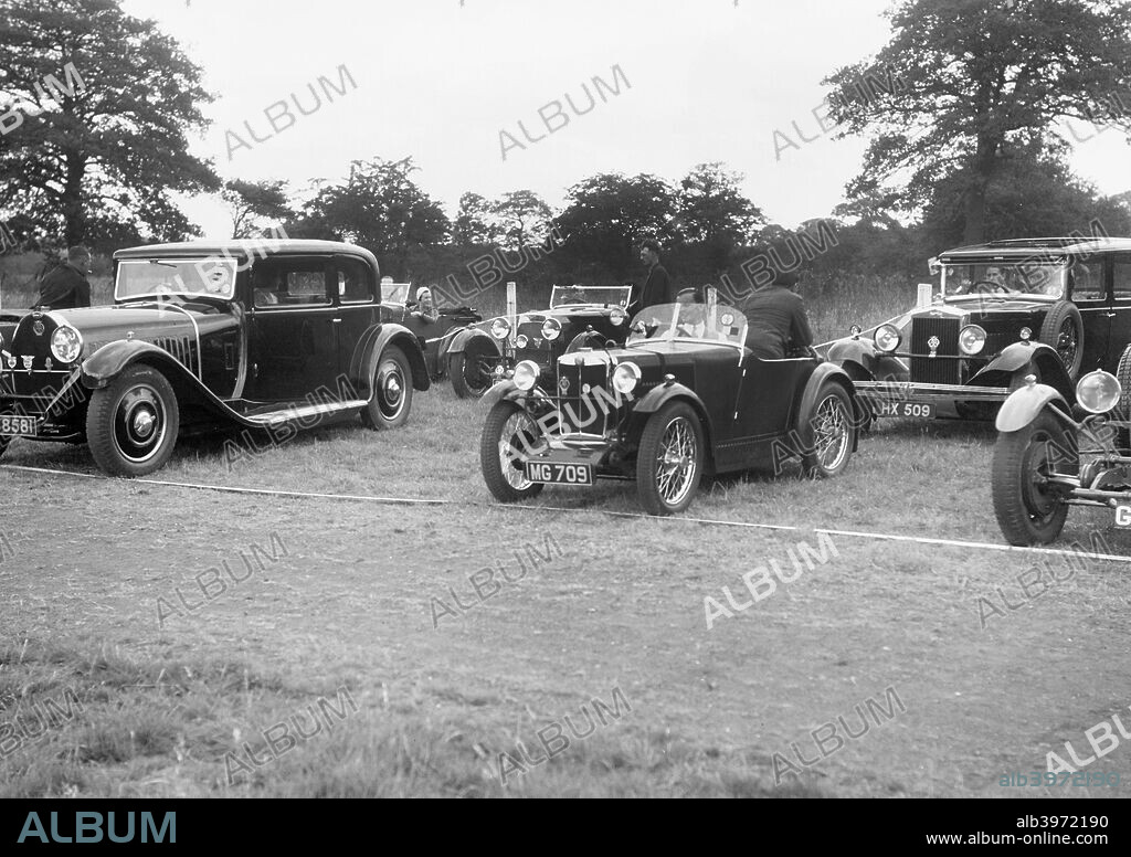 Bugatti  Type 46 5350 cc. Vehicle Reg. No.  GC8581. Left of centre: Aston Martin 1496 cc.  Reg. No.  GO1025. Centre: MG M 847 cc.  Reg. No.  MG709. Right of centre: Morris Major  Reg. No.  HX509. Bugatti O.C. Gymkhana. Date: 5.7.31.