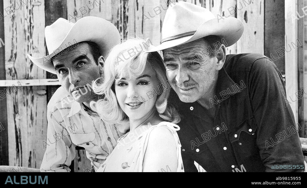 NORMA JEAN BAKER, Clark Gable and MONTGOMERY CLIFT. CLARK GABLE, MARILYN MONROE and MONTGOMERY CLIFT in THE MISFITS, 1961, directed by JOHN HUSTON. Copyright UNITED ARTISTS/SEVEN ARTS.