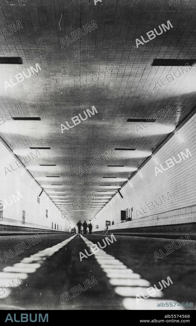 New Tunnel To Link U.S. States -- A view of the new Lincoln Tunnel under the Hudson River which joins New York City with Weehawken, New Jersey, showing how the new interstate highway is all but completed. The tunnel will be formally dedicated on December 21st and opened to traffic on the 22nd. December 10, 1937. (Photo by Keystone).