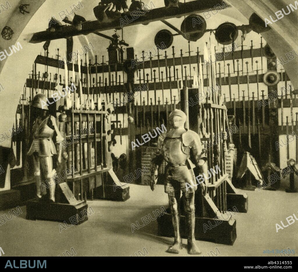 Armoury, Burg Kreuzenstein, Lower Austria, c1935. Exhibition of armour and weapons in the castle of Kreuzenstein near Leobendorf. From "Österreich - Land Und Volk", (Austria, Land and People). [R. Lechner (Wilhelm Müller), Vienna, c1935].