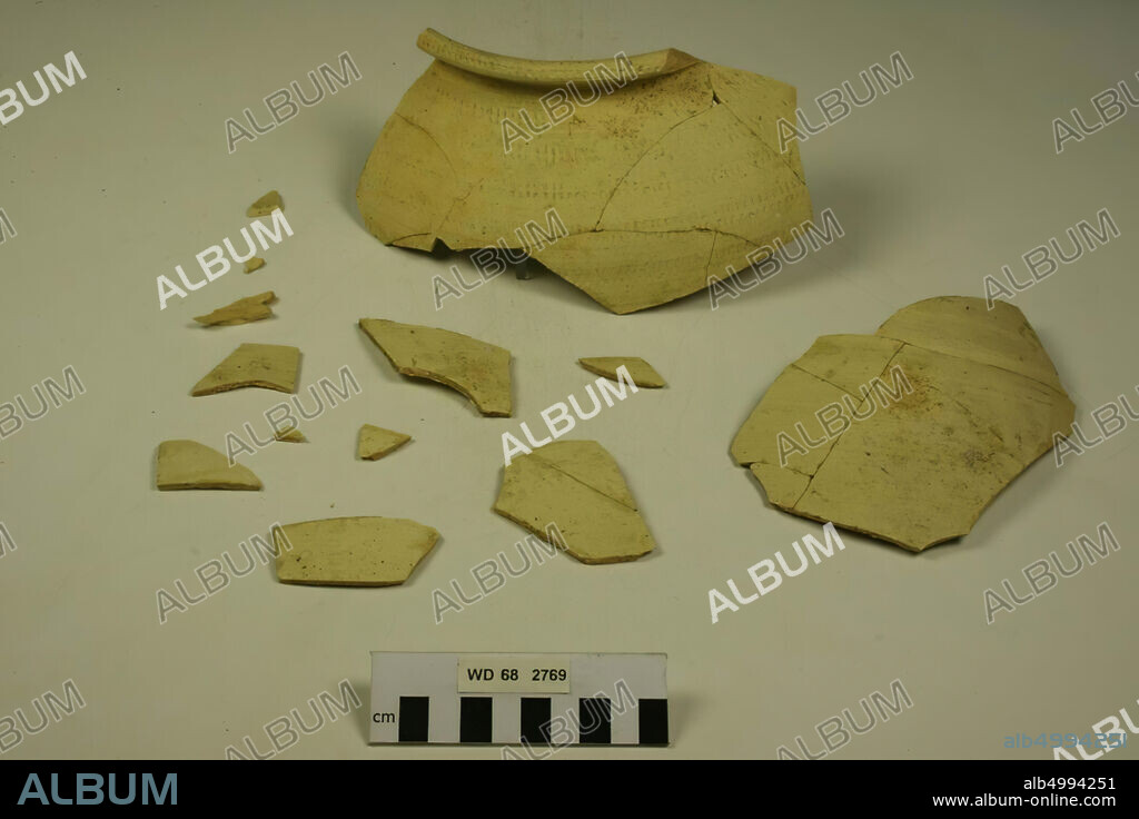 17 shards of Badorf pottery. Unstable bonding, shards, earthenware (Badorf), 24 x 17.5 x 13 cm (largest shard), The Netherlands, Utrecht, Wijk bij Duurstede, Wijk bij Duurstede, Dorestad.