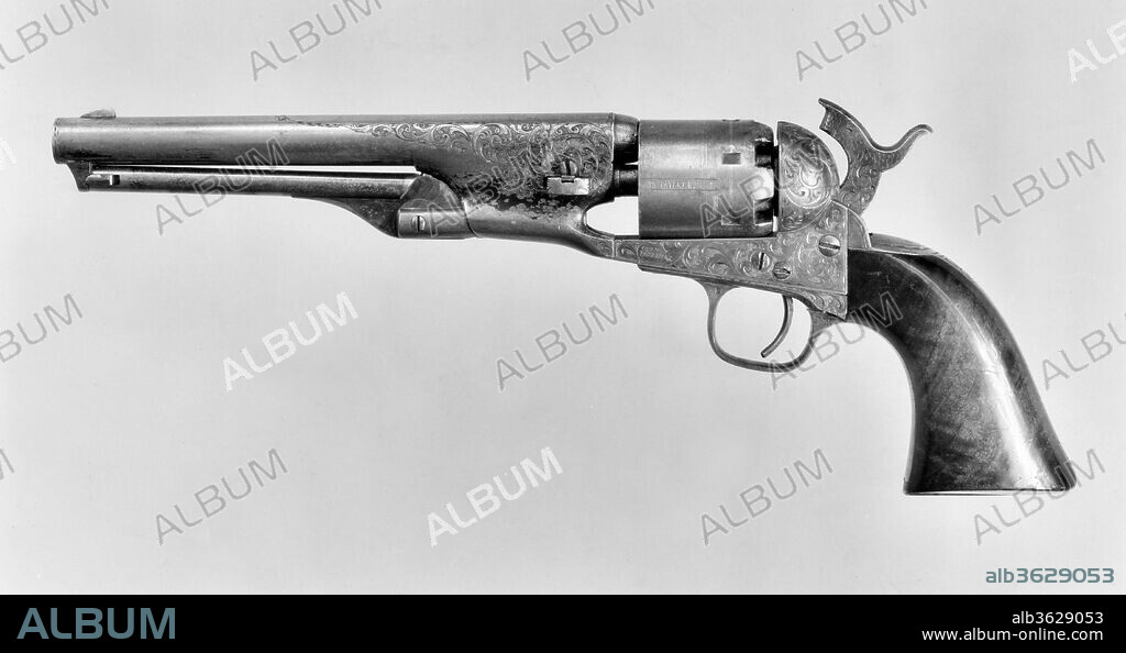 Colt Model 1861 Navy Percussion Revolver, serial no. 12240. Culture: American, Hartford, Connecticut. Dimensions: L. 12 3/4 in. (32.39 cm); L. of barrel 7 1/2 in. (19.05 cm); Cal. .36 in. (9.1 mm). Manufacturer: Samuel Colt (American, Hartford, Connecticut 1814-1862). Date: 1863.
This pistol was presented by the Colt factory to American journalist and politician Horace Greeley (1811-1872).