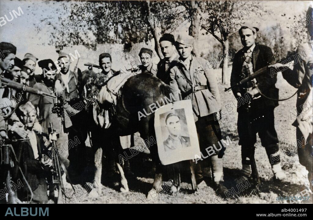 Mikhailovich partisans, Yugoslavia, 1939-1945. Draza Mihailovic (1893-1946) was a Yugoslav Serb general during World War II. A staunch royalist, he retreated to the mountains near Belgrade when the Germans overran Yugoslavia in April 1941 and there he organized bands of guerrillas known as the Chetnik Detachments of the Yugoslav Army. The organisation is commonly known as the Chetniks, although the name of the organisation was later changed to the Yugoslav Army in the Homeland.