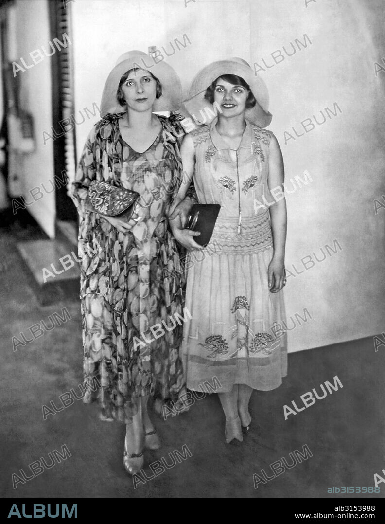 Manila, Phillipines:  March 23, 1931. Aimee Semple McPherson(L), and her daughter, Roberta, as they stopped at the Manila Hotel en route to India. They were serenaded with 'Four Square Gospel' hymns in Tagalog by natives converted by one of her Filipino missionaries from Los Angeles.