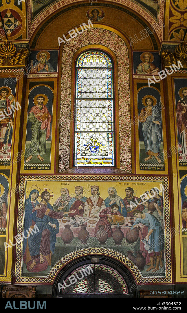 Zagreb, Croatia, Republika Hrvatska. The Orthodox Cathedral, dedicated to the Transfiguration of Jesus, was built in 1866 to a design by the Croatian architect Franjo Klein. It was restored in 1883-1884 by the architect Herman Bollé. The bell tower was built in 1899, while the facade was completely modified in 1913-1914.The interior orf the church. A fresco depicting the Wedding of Cana.