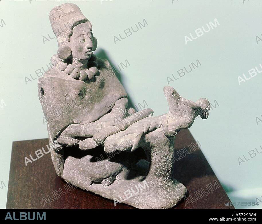 Maya culture, Classic period. Figurine of a woman weaving. Terracotta. Origin: Jaina Island, Campeche, northwest Yucatan. Mexico City, Museo Nacional de Antropologia.