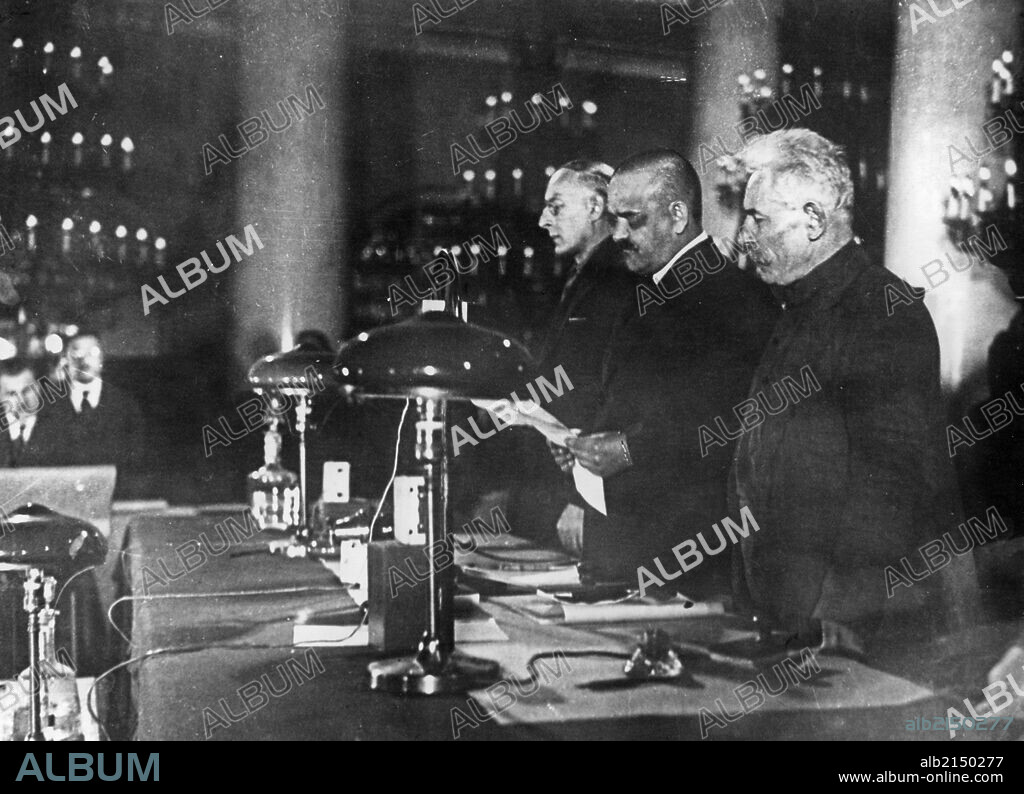 Nikolai shvernik reading the sentence handed down by the supreme court at a trial of menshevik counter-revolutionaries in moscow, 1931.