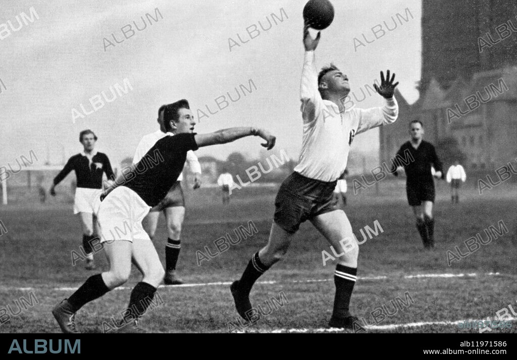 An exciting game in the German handball championship. Here a team member from Berlin is seen playing for the No. 1 Spandauer Handball Club. ©TopFoto.
