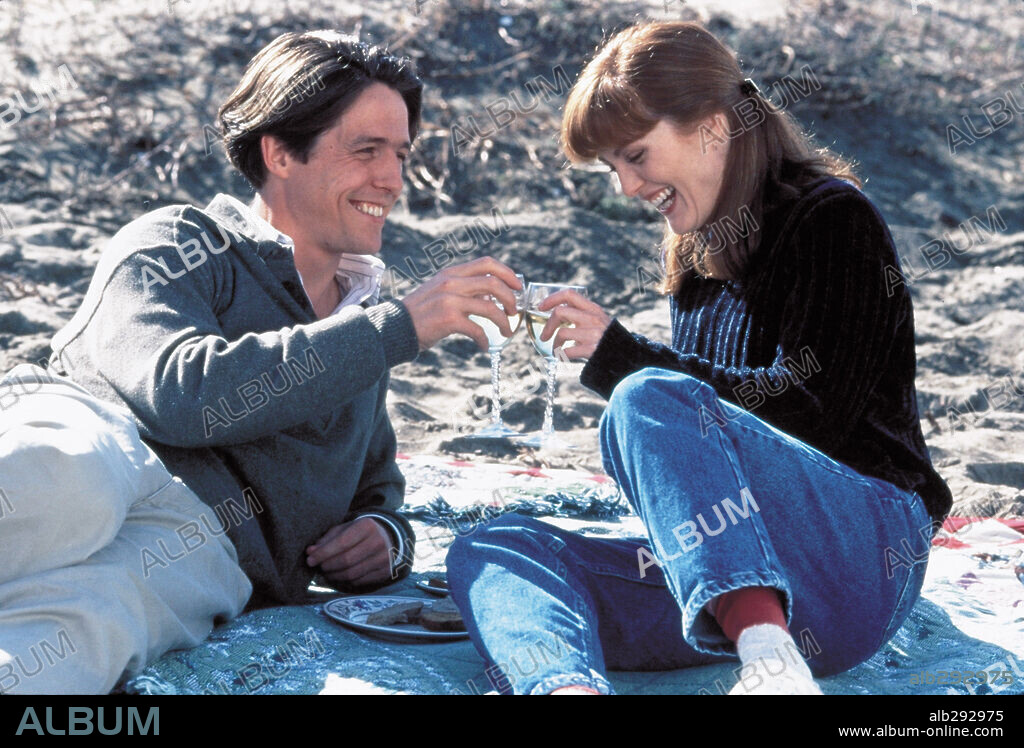 HUGH GRANT y JULIANNE MOORE en NUEVE MESES, 1995 (NINE MONTHS), dirigida por CHRIS COLUMBUS. Copyright 20TH CENTURY FOX / BRAY, PHIL.