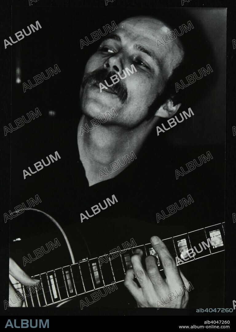 Guitarist John Coverdale playing at The Bell, Codicote, Hertfordshire, January 1984.