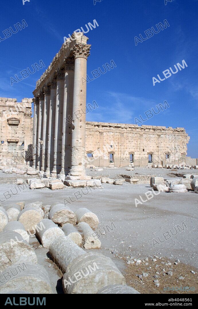 Courtyard of the Temple of Bel, Palmyra, Syria. Situated in an oasis in the Syrian desert halfway between the Mediterranean and the Euphrates, Palmyra grew up as an important caravan town on the old Silk Road. The city became part of the Roman Empire during the reign of Tiberius in the first half of the 1st century AD. The Temple of Bel is thought to date from this time although the mound upon which it stands is thought to have been a site of worship since the 2nd millennium BC.