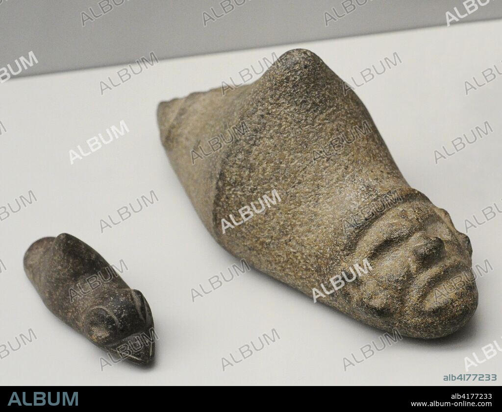 Three-Cornered Stone (Trigonolito). Portable-sized sculptures, known as three-pointed stones or trigonolitos. Stone. They used to show human attributes interpreted as depictions of the yucca god. Taino culture (1000-1500 AD). Antilles. Museum of the Americas. Madrid, Spain.