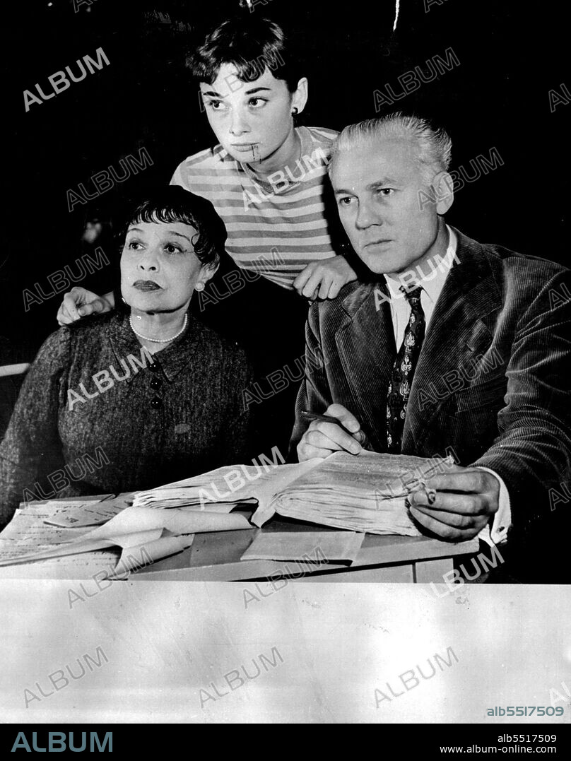 Anita Loos, Audrey Heburn, young British actress who is to play title role in "Gigi," and director Raymond Rouleau.Anita Loos today still wears her hair as she did 25 years ago but keeps it a bit tidier. October 1, 1953. (Photo by Associated Press Newsphoto).
