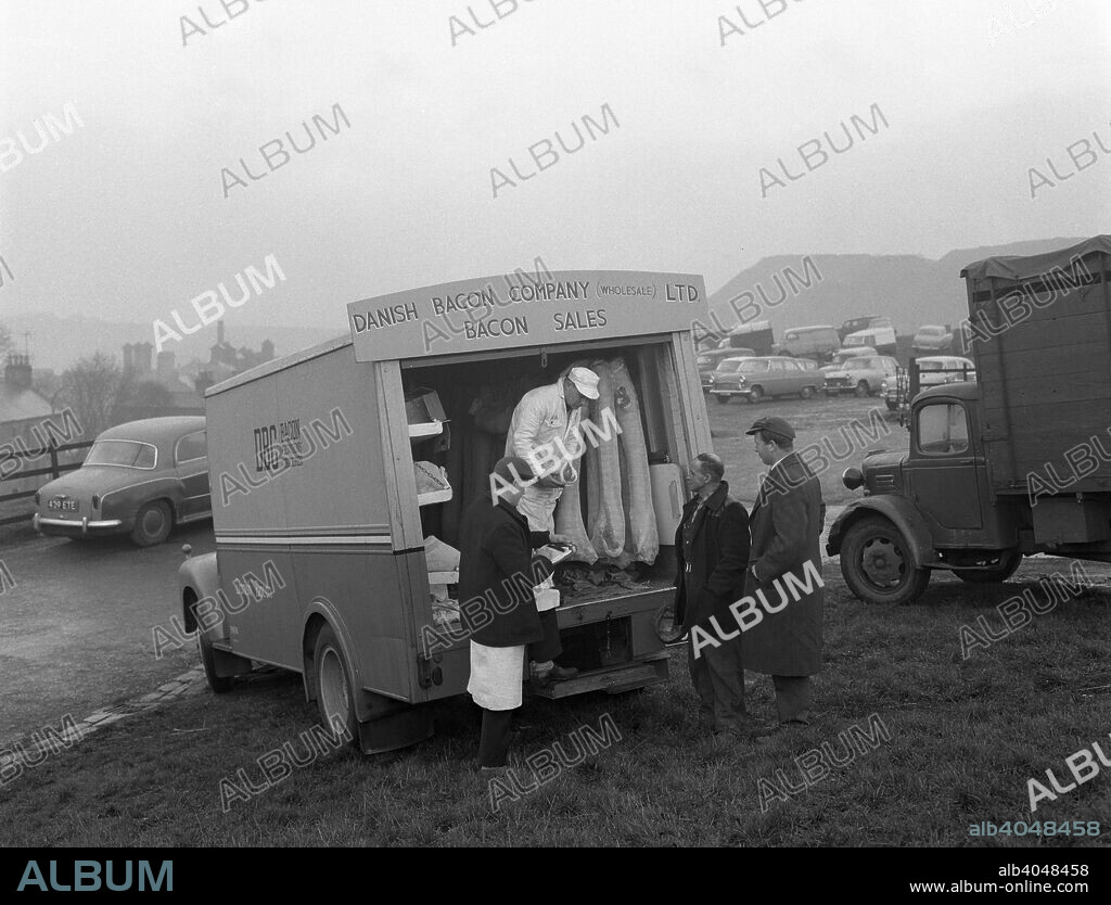 Danish Bacon Company wholesale lorry at Barnsley Market, South Yorkshire, 1961. Delivering produce to the butchery traders. Danish Bacon operated from a depot in nearby Kilnhurst for a number of years before moving to a new trading park in 2006.