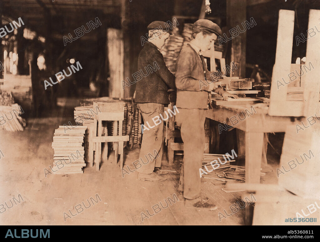Two Young Boys Making Grate Bottoms at Basket Factory, Evansville, Indiana, USA, circa 1908.