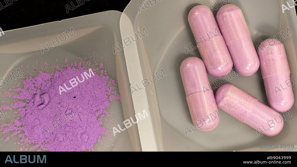 lsd in powder and capsule form. Lysergic acid diethylamide or acid, a psychedelic drug of the ergoline family, well known for its psychological effect.