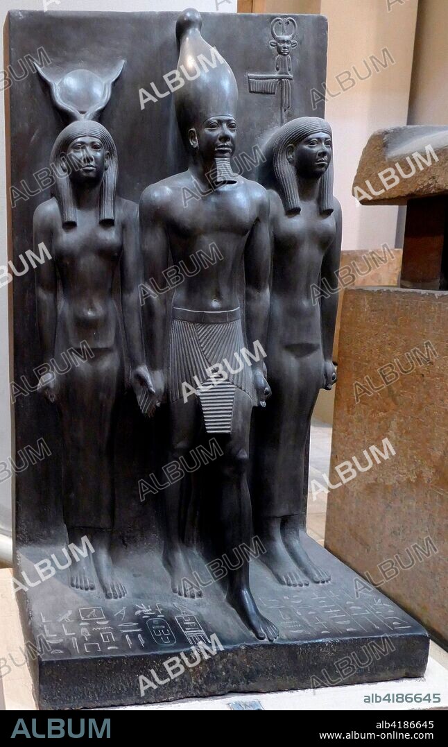 King Menkaure flanked by Hathor and a Goddess. 2490-2472 BC. Statue in relief. from Giza. Egypt.