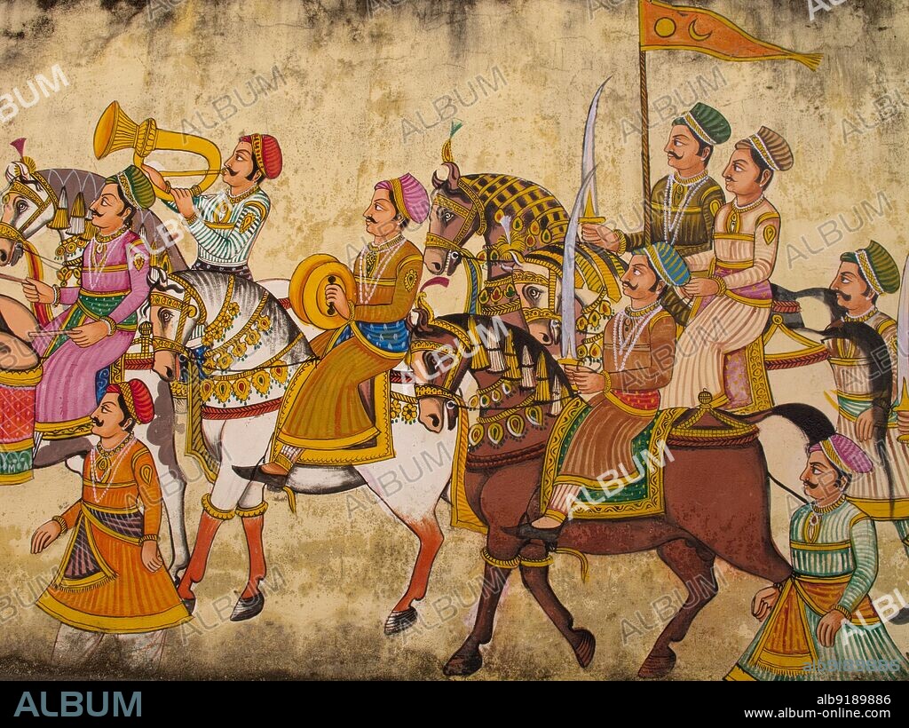 India: A procession of Rajput soldiers - mural on a wall in Udaipur, Rajasthan. Rajput (from Sanskrit raja-putra, 'son of a king') is a member of one of the patrilineal clans of western, central, northern India and some parts of Pakistan. They claim to be descendants of ruling Hindu warrior classes of North India. Rajputs rose to prominence during the 6th to 12th centuries. Until the 20th century, Rajputs ruled in the overwhelming majority of the princely states of Rajasthan and Surashtra, where the largest number of princely states were found.