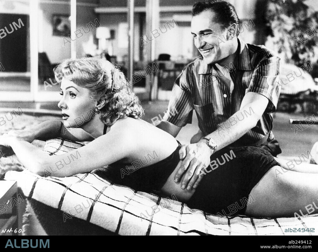 RHONDA FLEMING und VINCENT PRICE in WHILE THE CITY SLEEPS, 1956, unter der Regie von FRITZ LANG. Copyright RKO.